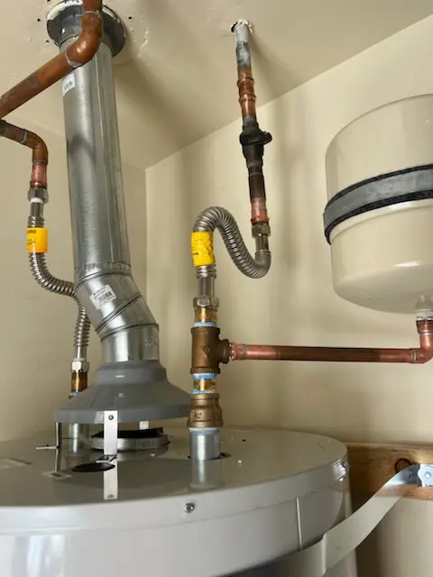 Water heater installation and plumbing repair in Rossville